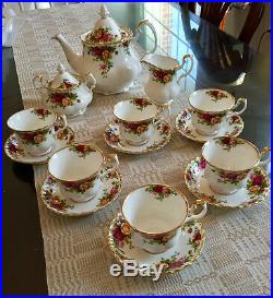 Old Country Roses Tea Set with teapot, creamer, sugar, and six cups and saucers