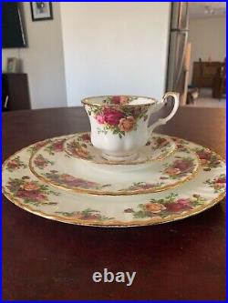 Royal albert China old country rose pattern. Setting for 4 with goblet