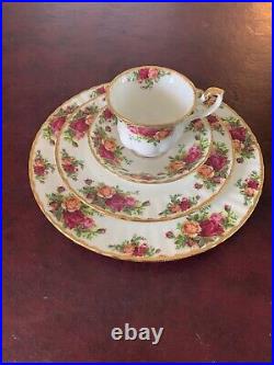 Royal albert China old country rose pattern. Setting for 4 with goblet