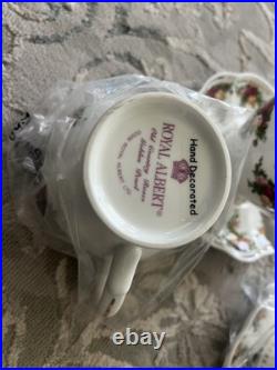 Royal albert old country roses tea set 4 Cups 4 Saucers